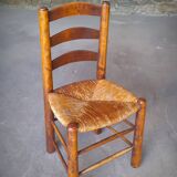 Set of 4 straw-covered brutalist chairs by George Robert
