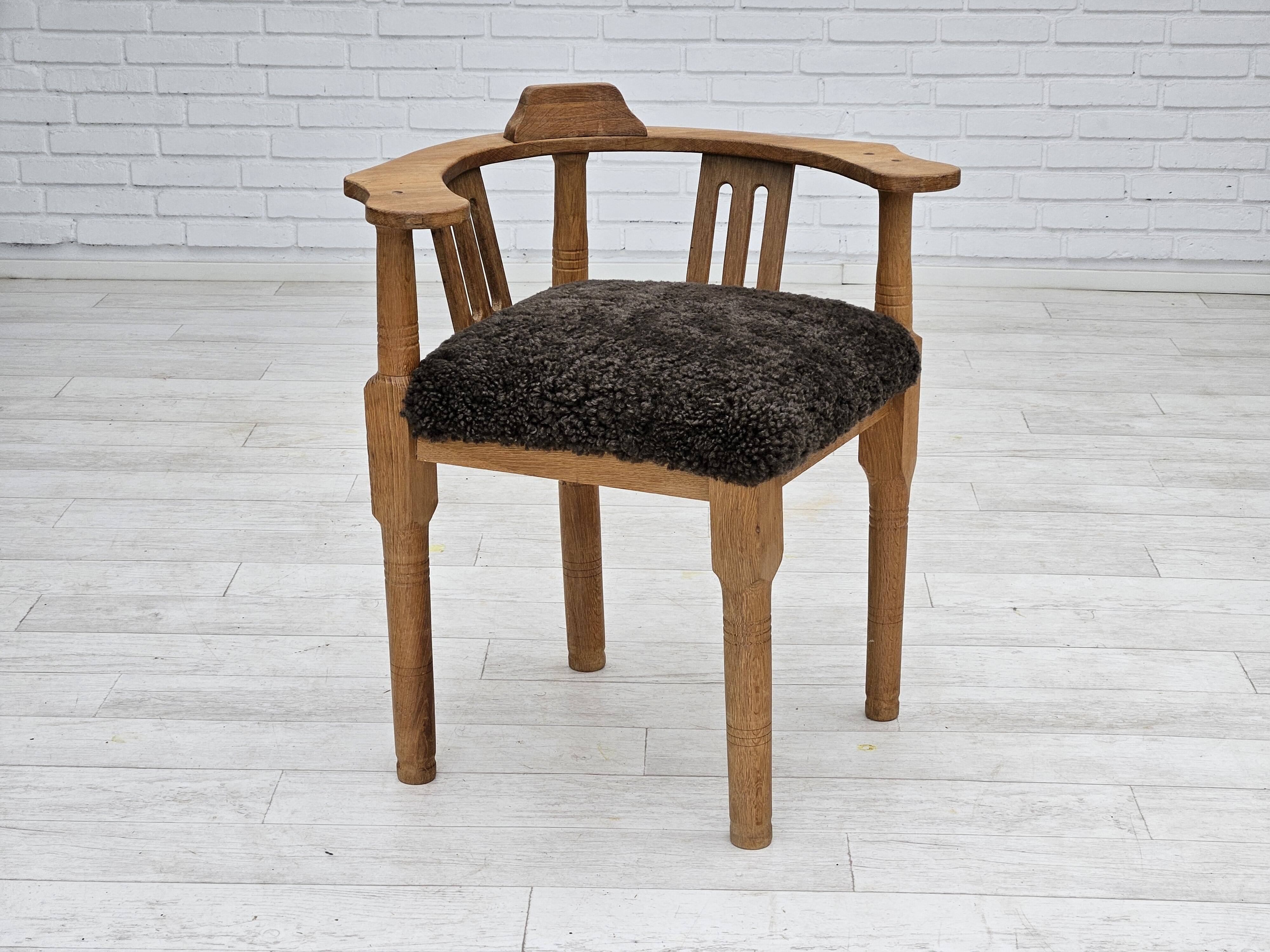 1950s, Danish design, reupholstered armchair, New Zealand sheepskin, oak wood.