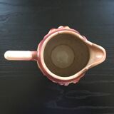 Old pitcher with pink iris decor