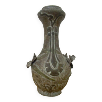 old stone-colored vase, heavy, very stable, plant and geometric patterns