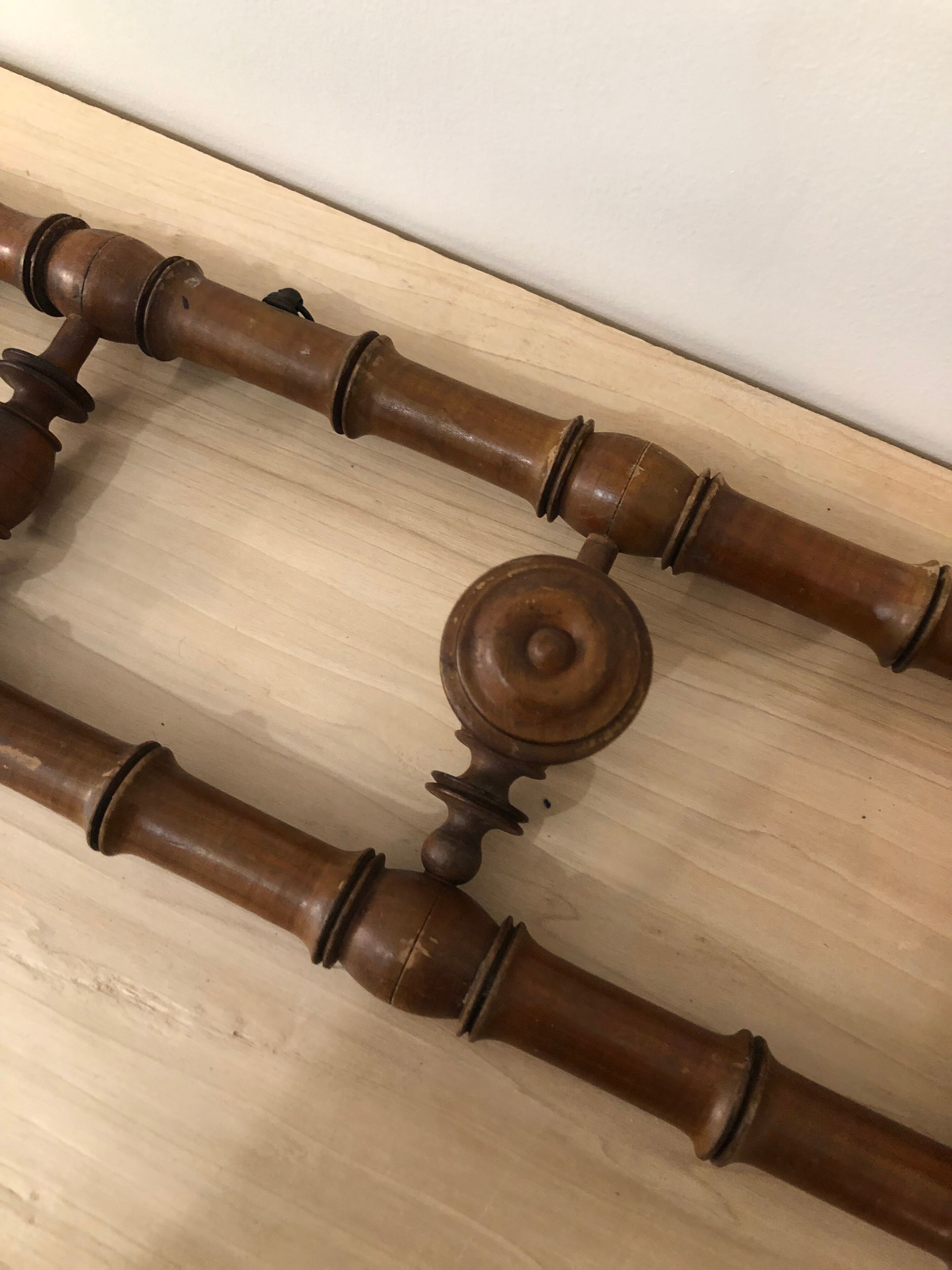 Wooden coat rack with swivel hooks