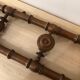 Wooden coat rack with swivel hooks