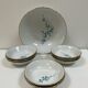 Vintage porcelain service: salad bowl and 8 small bowls.