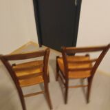 Pair of vintage wooden and woven straw chairs