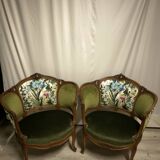 Paire de fauteuils en bois sculpté, XXème s.