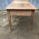 Antique solid cherry farm table with 3 front drawers.