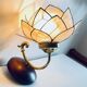 Vintage mother-of-pearl and brass flower wall light