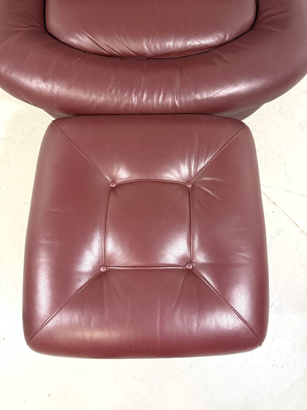 French burgundy leather space age lounge chair & footstool 1970’s