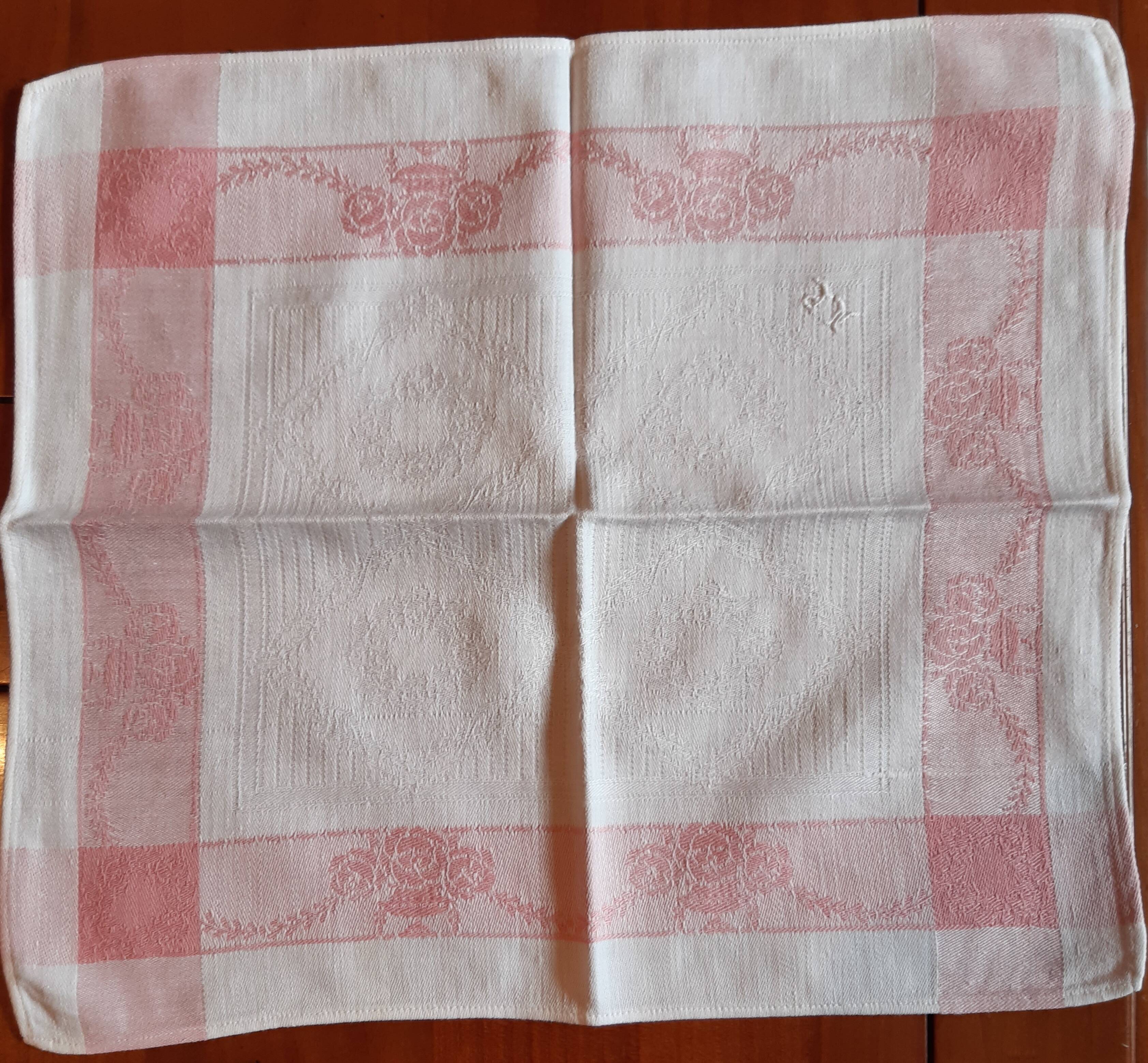 4 embroidered napkins on thread, tea service. Pink trim. Initials M.P.