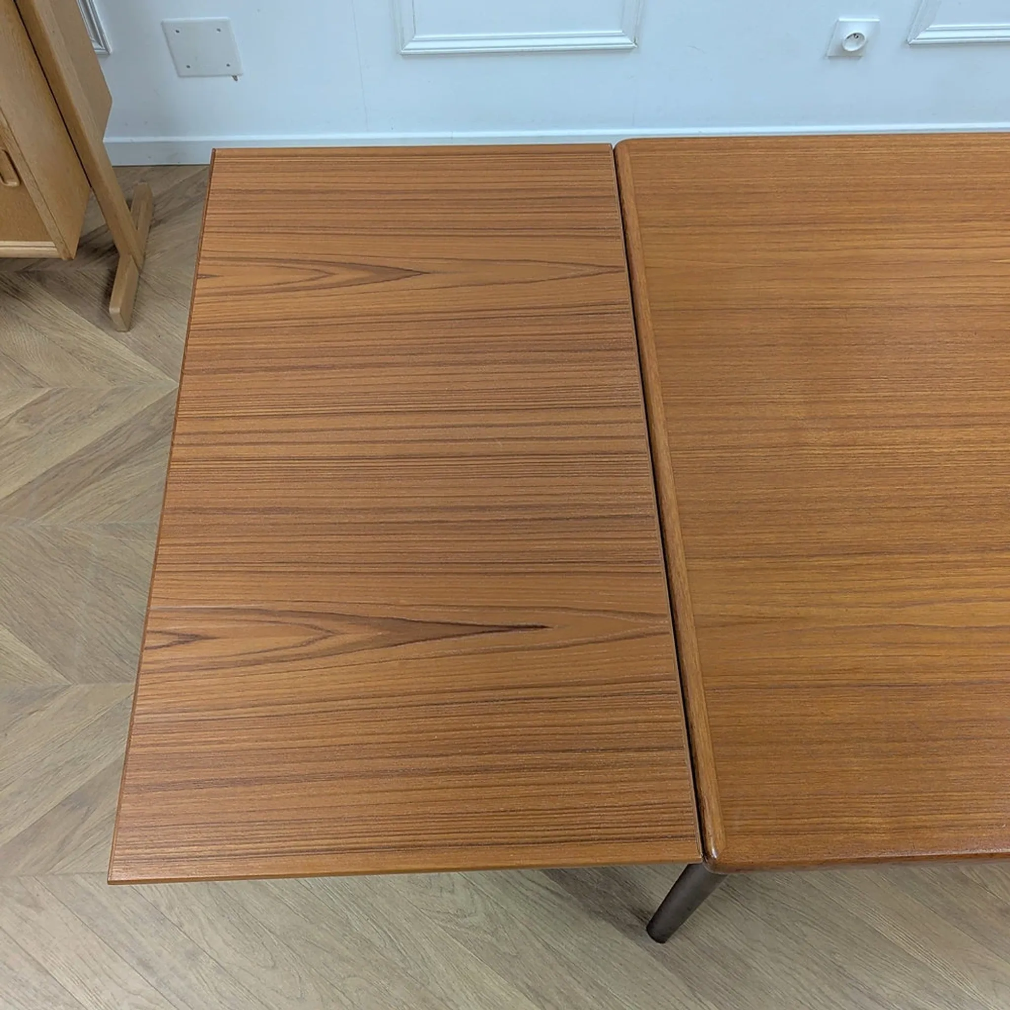 Vintage extendable dining table with 2 extensions in teak.