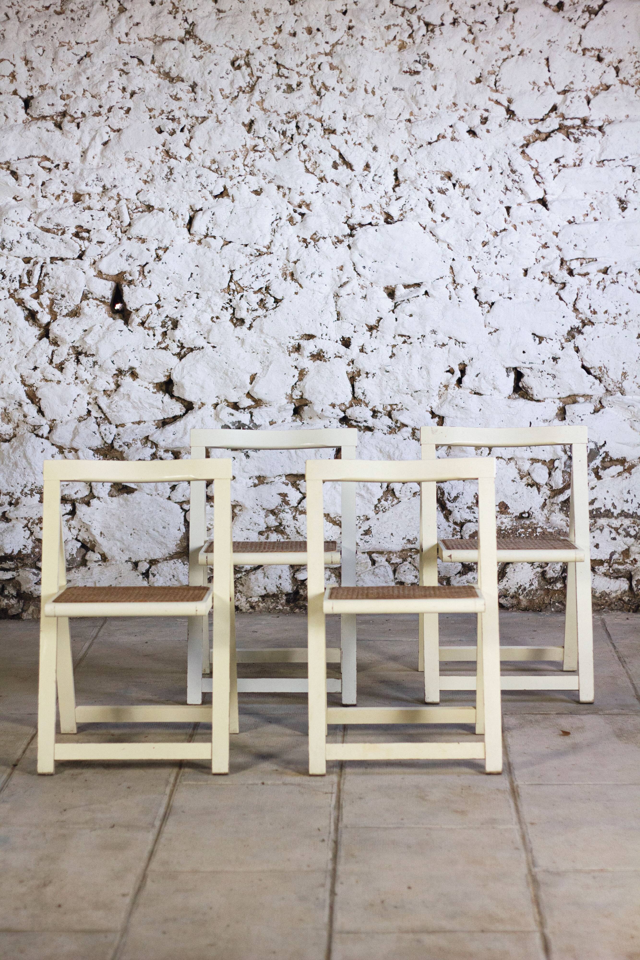 4 vintage folding cane chairs