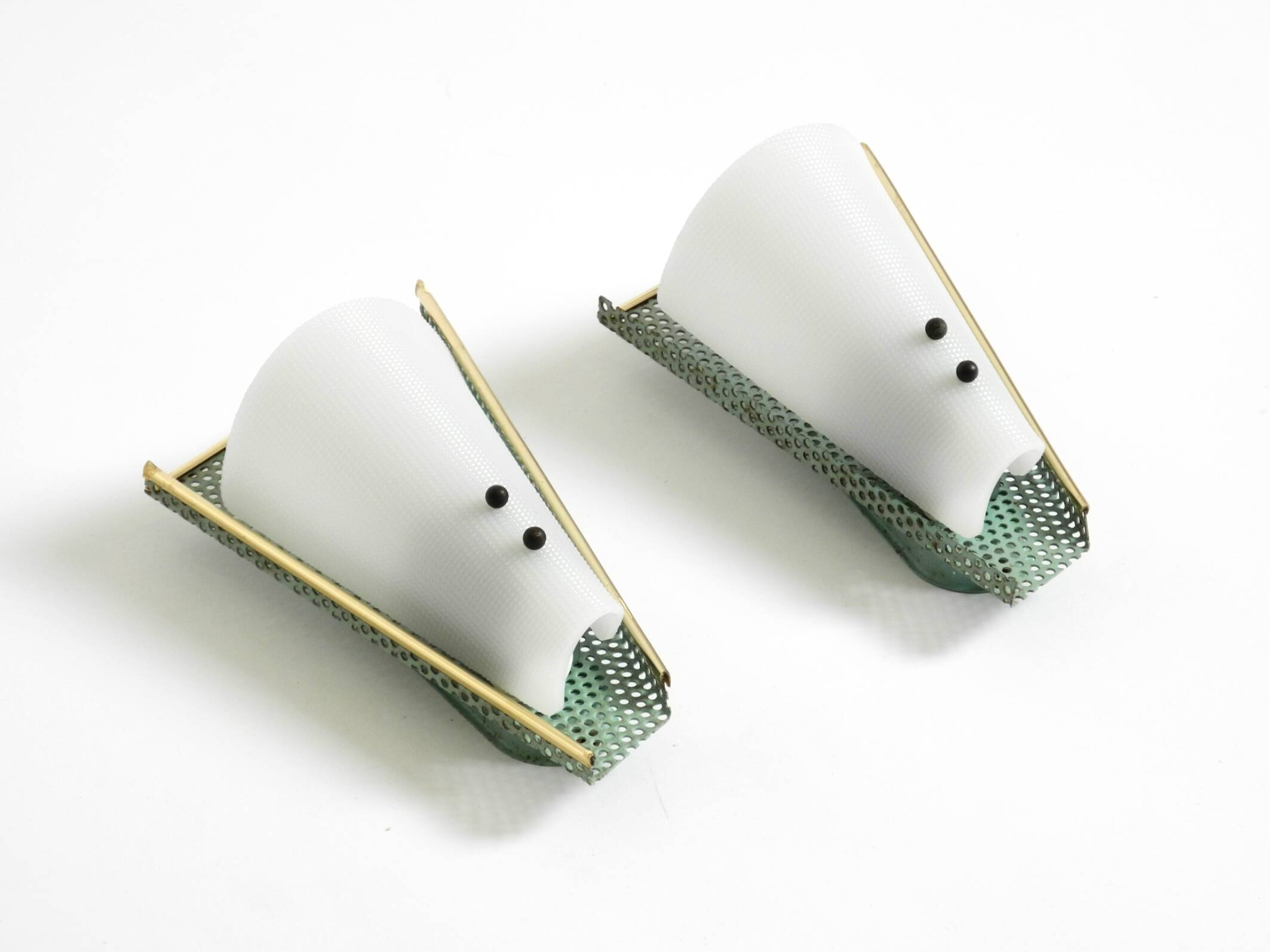 Pair of beautiful mint green Mid Century Modern perforated sheet metal wall