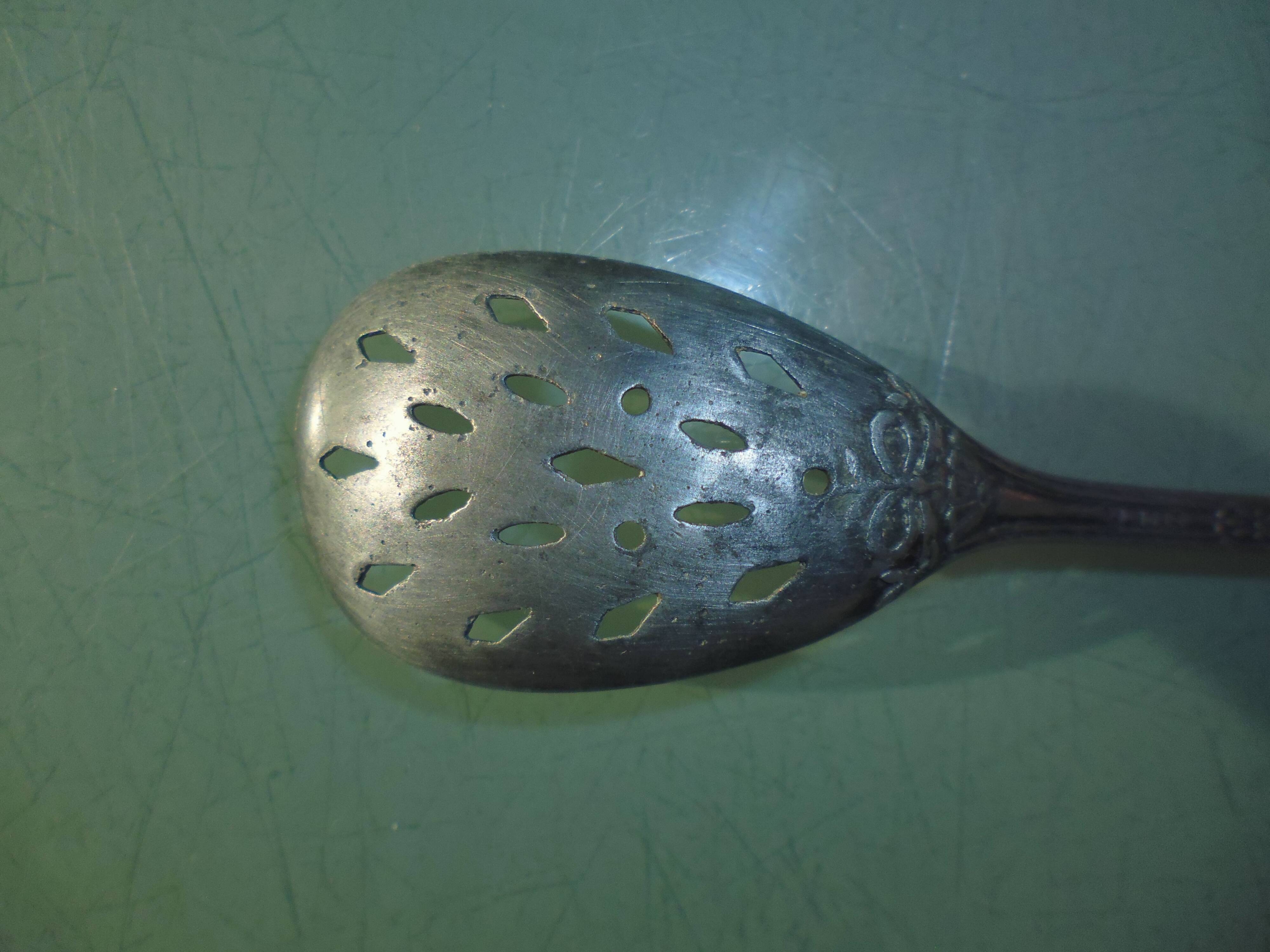 Cuillère à saupoudrer