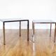 Pull-out tables in metal and glass