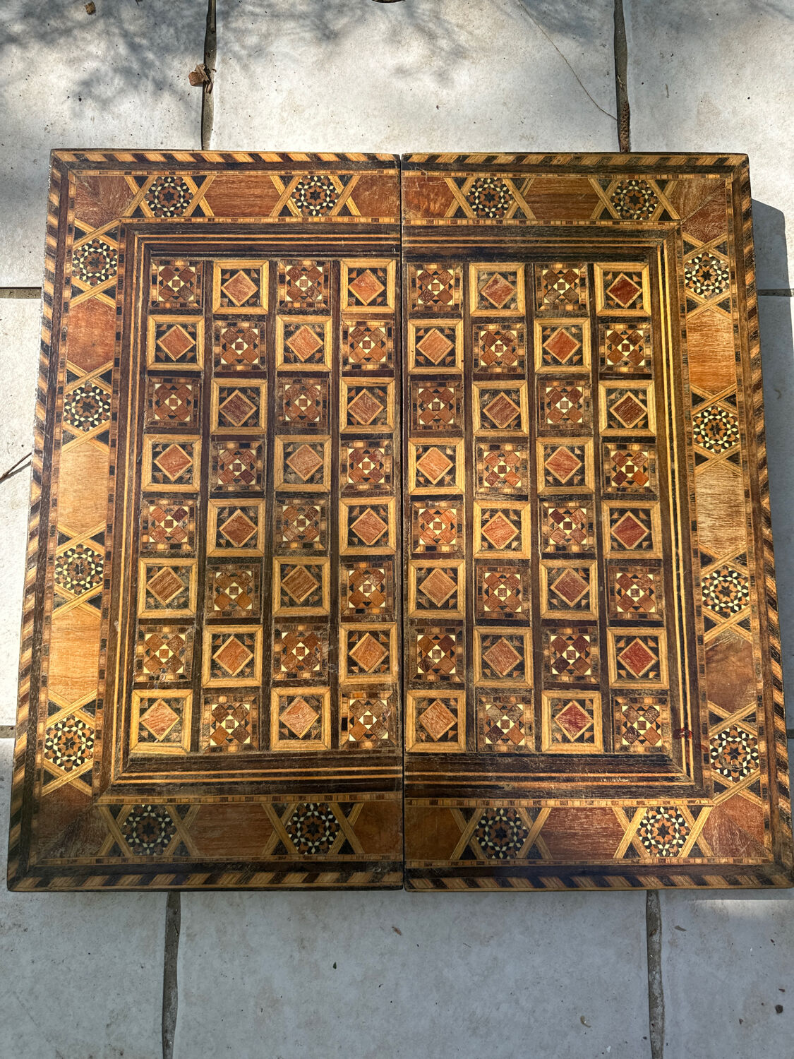 Ancient backgammon in marquetry
