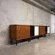 Enfilade buffet display cabinet in vintage 1950s style.