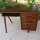 Bureau à pieds compas