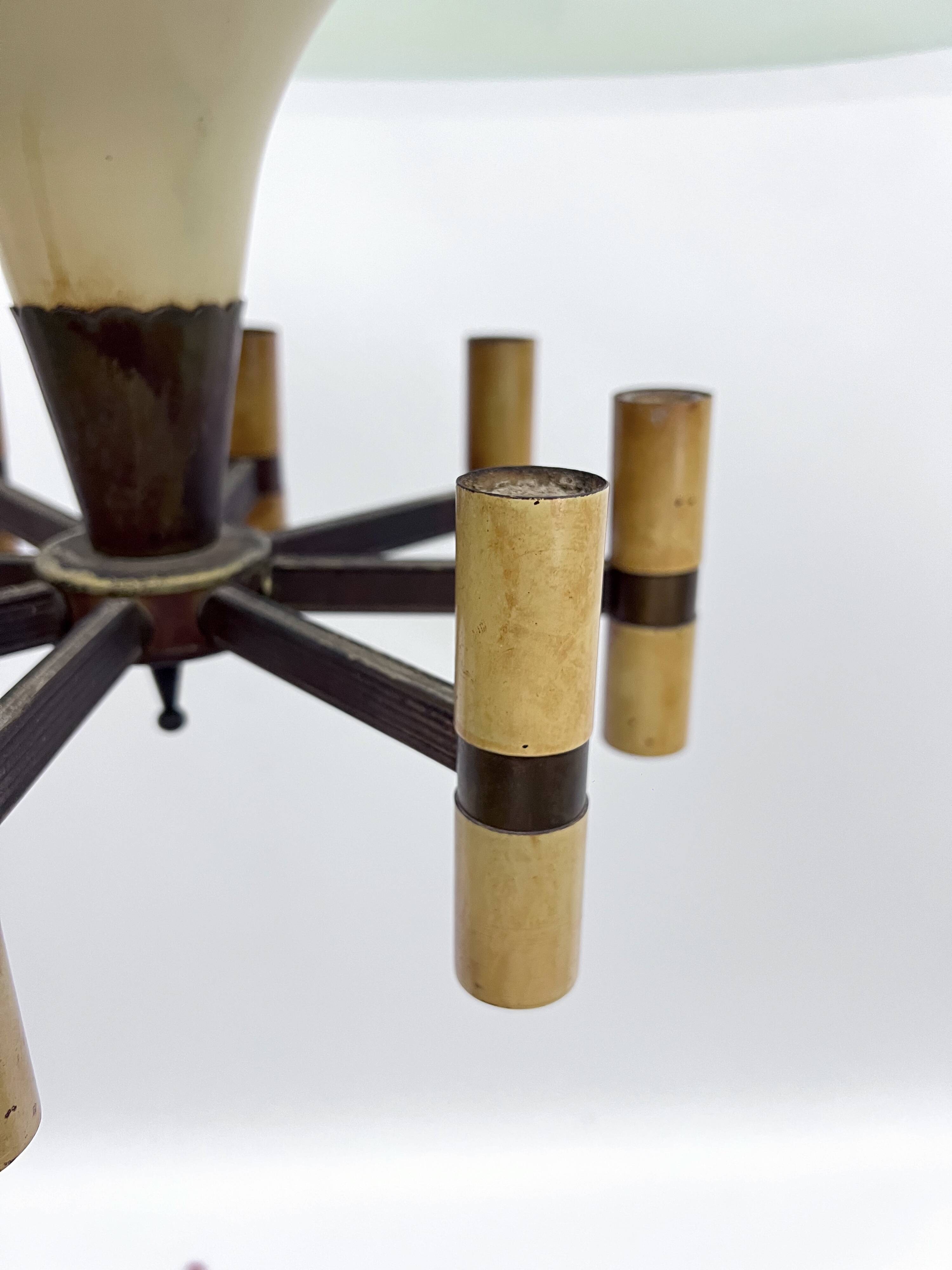 Curved glass disk chandelier. Italy 1950s