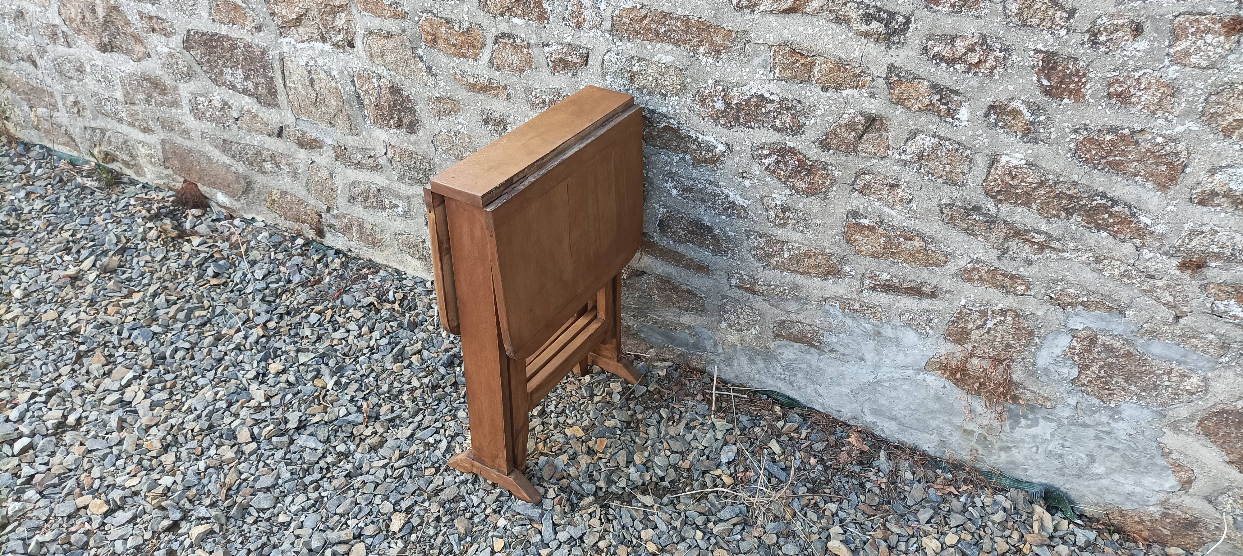 Old wooden table with double swings