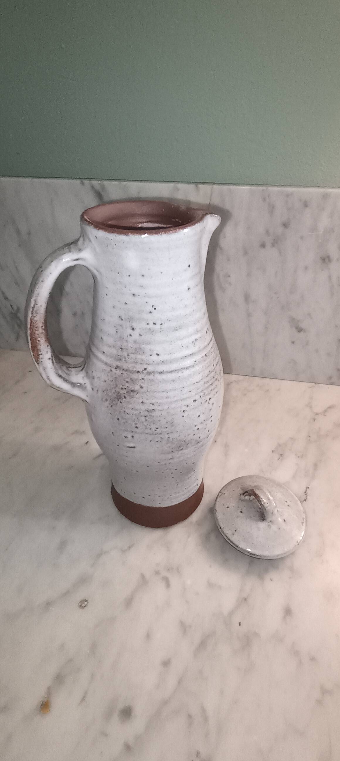 Ceramic pitcher signed by jeanne and norbert pierlot