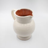 White pitcher in glazed stoneware