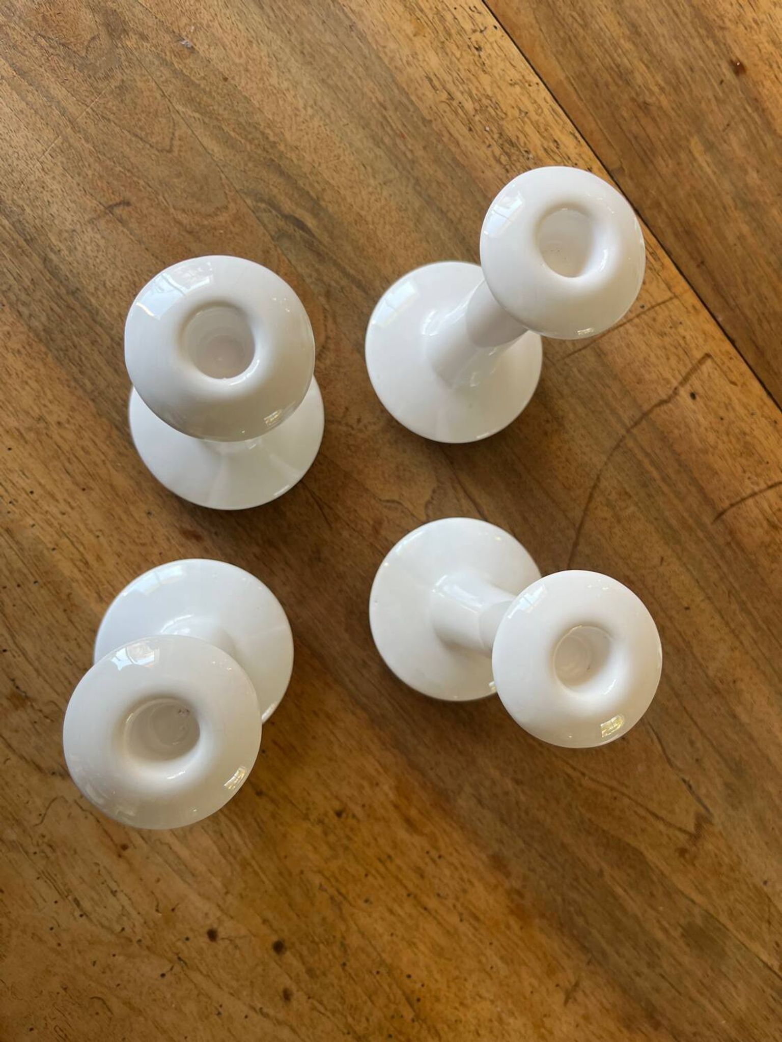 Set of 4 white ceramic candle holders