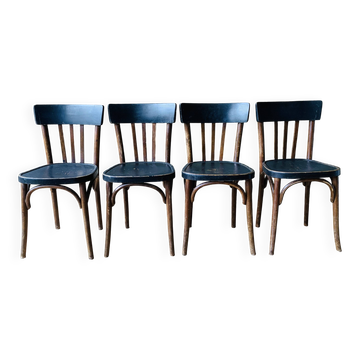 Set of four vintage bentwood bistro chairs.