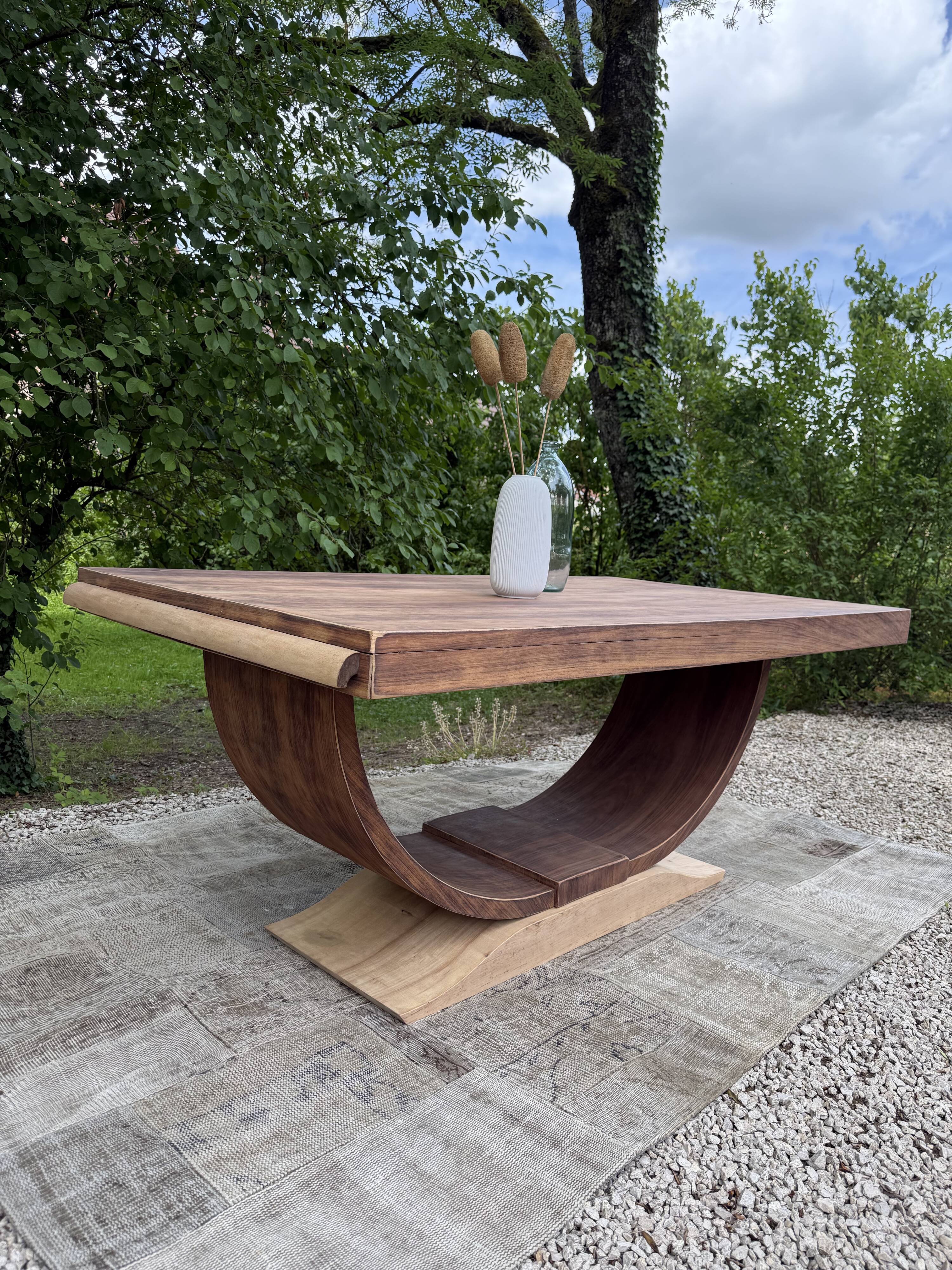 Renovated wooden table with extensions.
