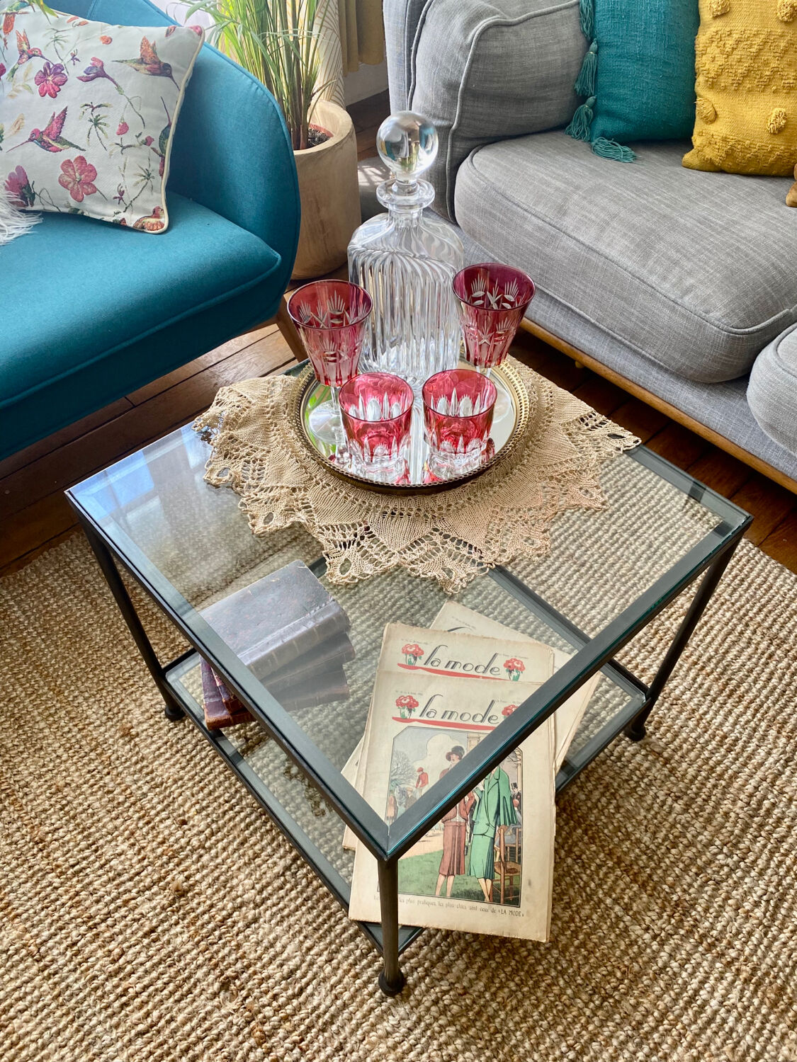Glass and wrought iron coffee table design