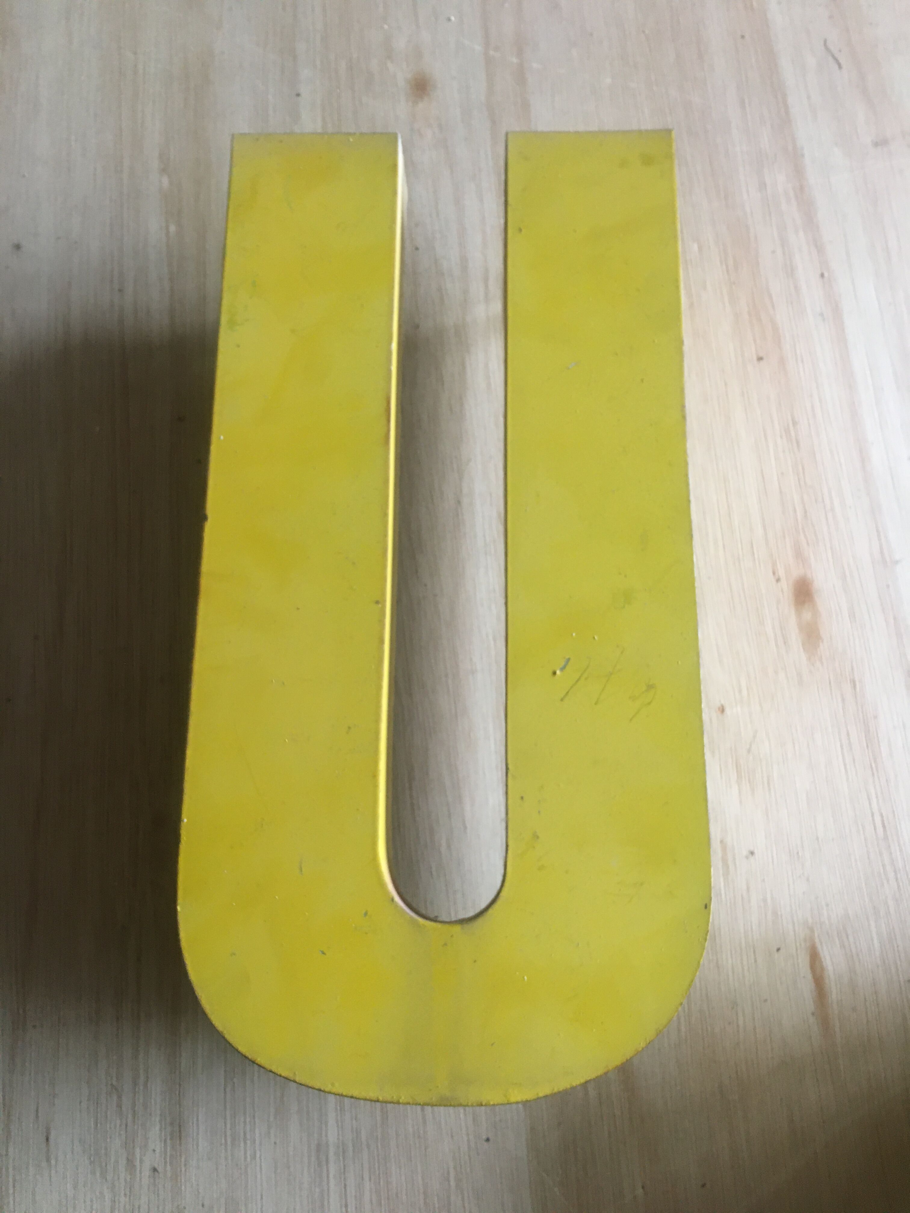 Vintage industrial letter in zinc