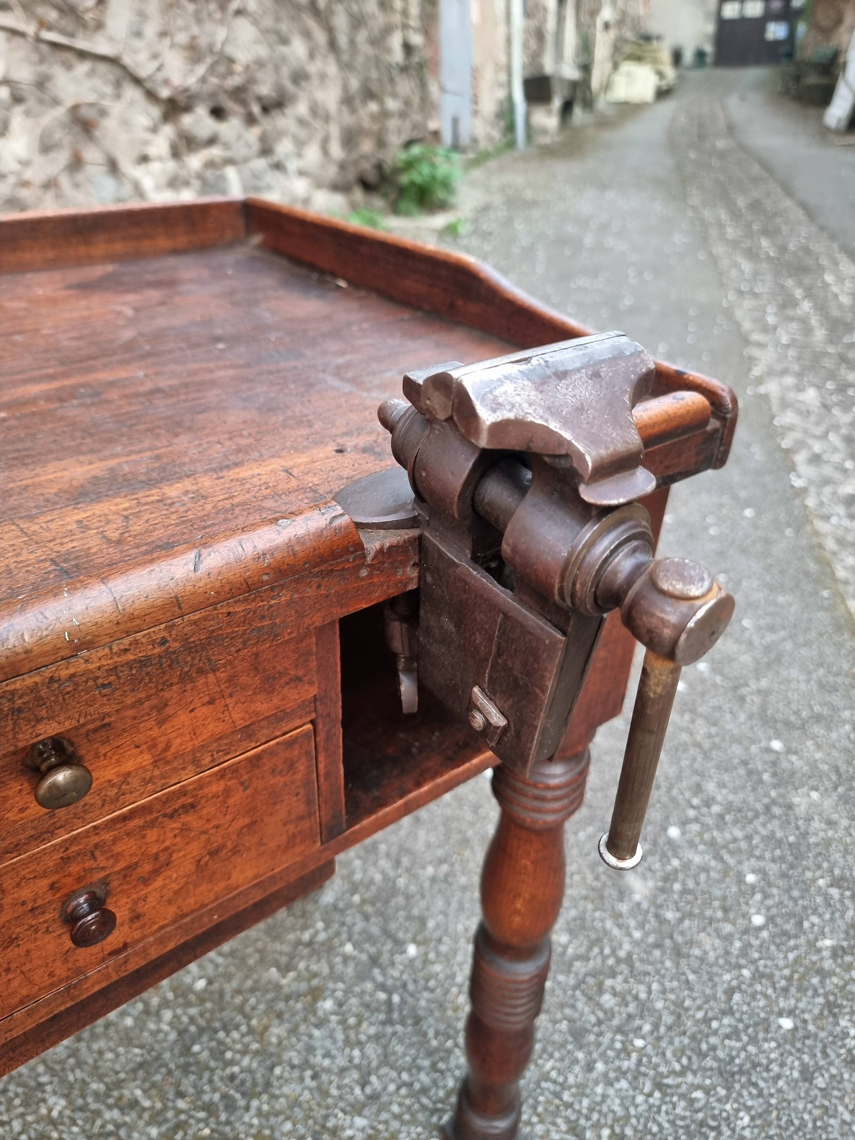 French antique watchmaker's bench – Table with drawers, vice, and original sliding leather surface – circa 1900