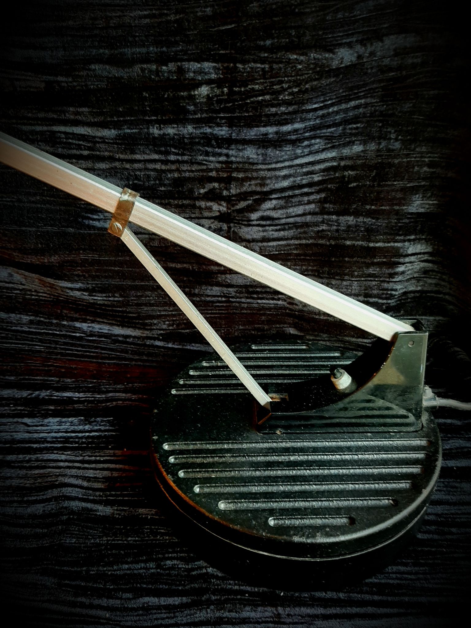 Red and black WL1 Anglepoise desk lamp. George Carwardine and Kenneth Grange, 1960.