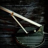 Red and black WL1 Anglepoise desk lamp. George Carwardine and Kenneth Grange, 1960.