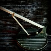 Red and black WL1 Anglepoise desk lamp. George Carwardine and Kenneth Grange, 1960.