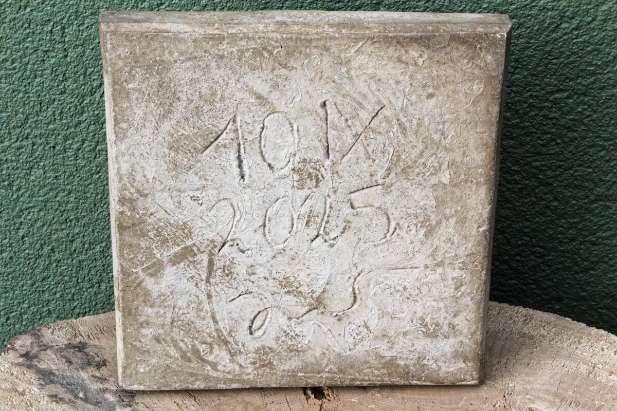 Cement frog, signed A. Picot