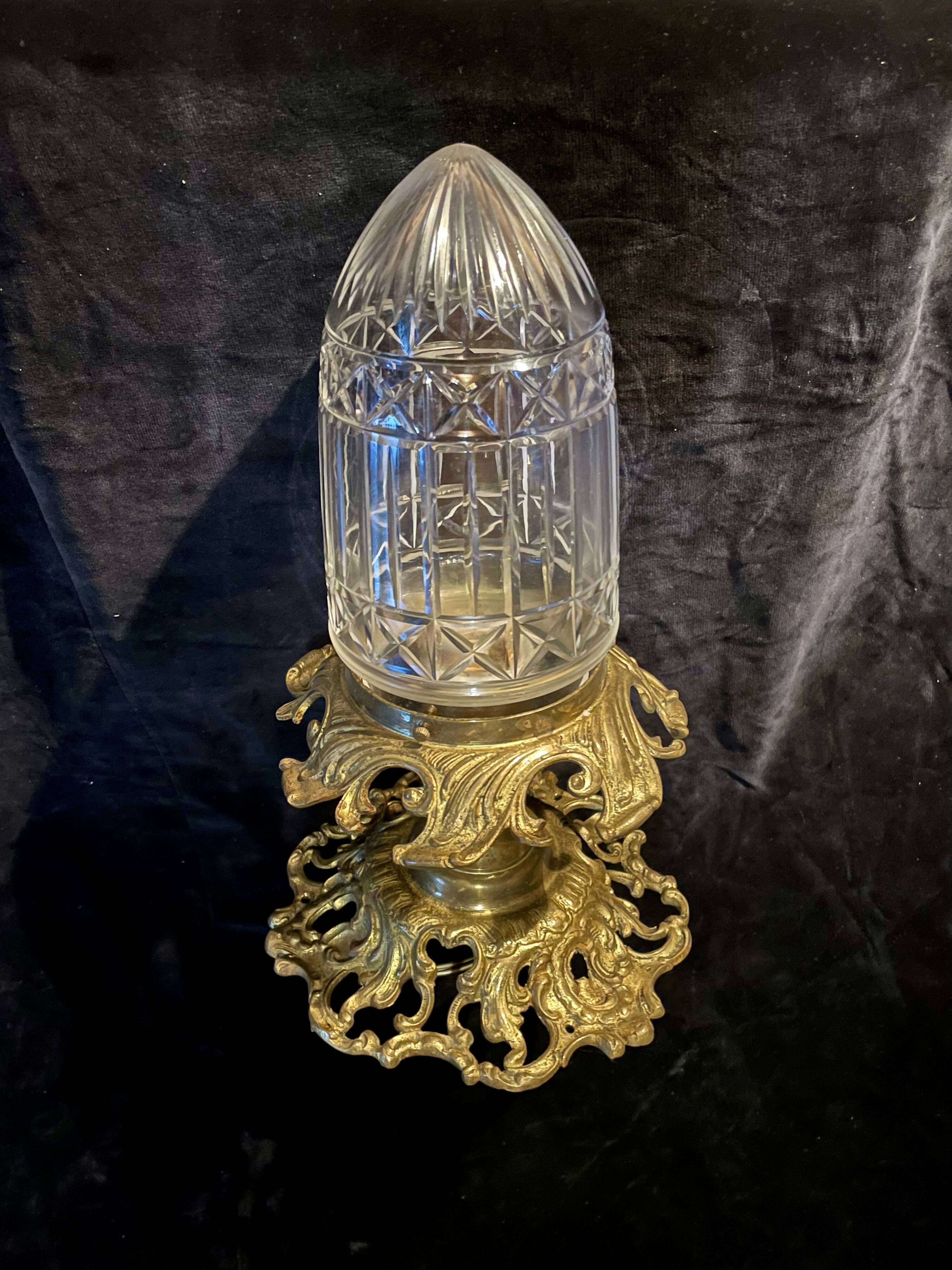 20th-century ceiling light, chiselled obus and brass.