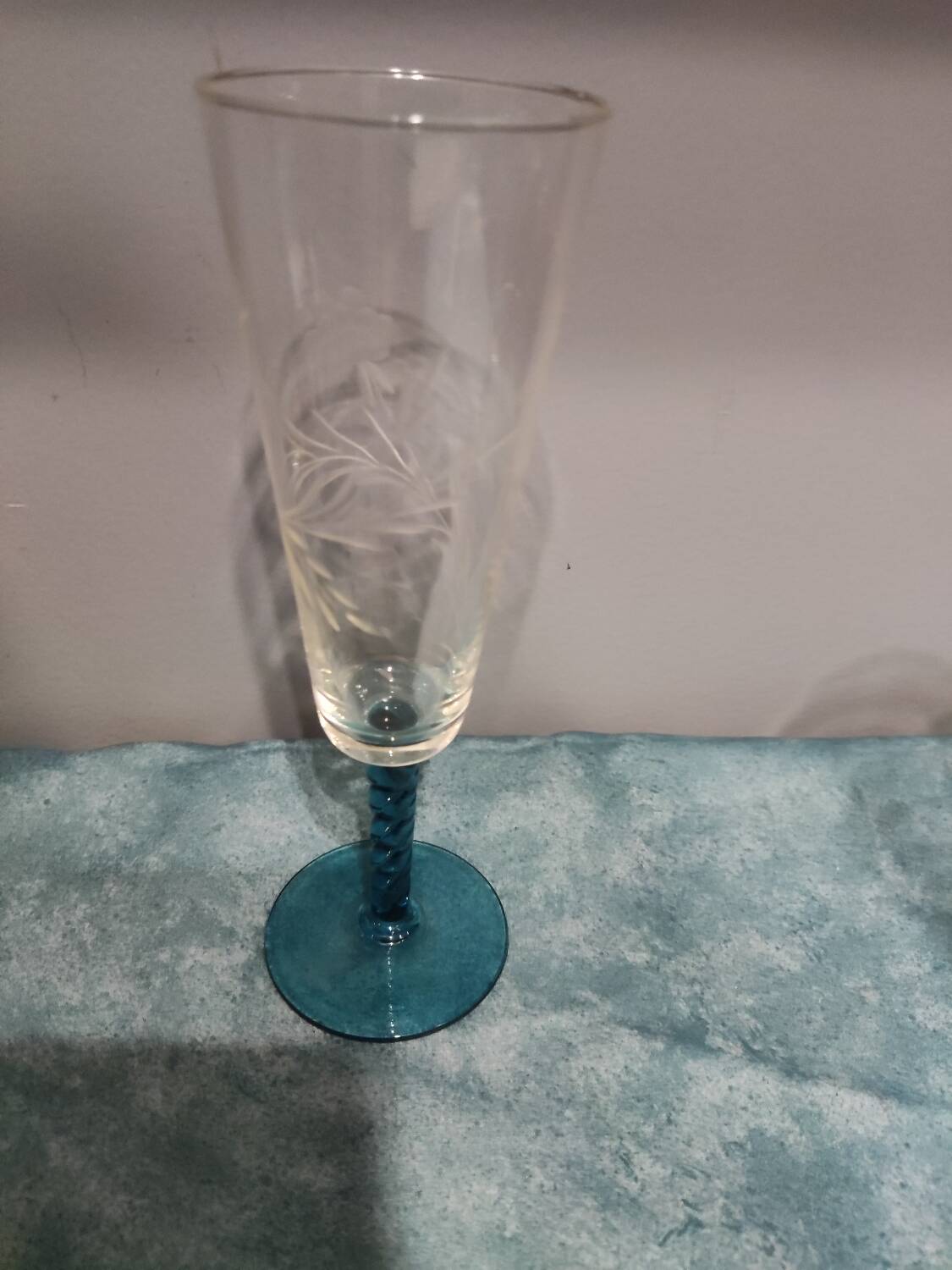 Four vintage stemmed glasses