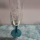 Four vintage stemmed glasses