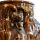 Important Longchamp Griffon vase in golden ceramic