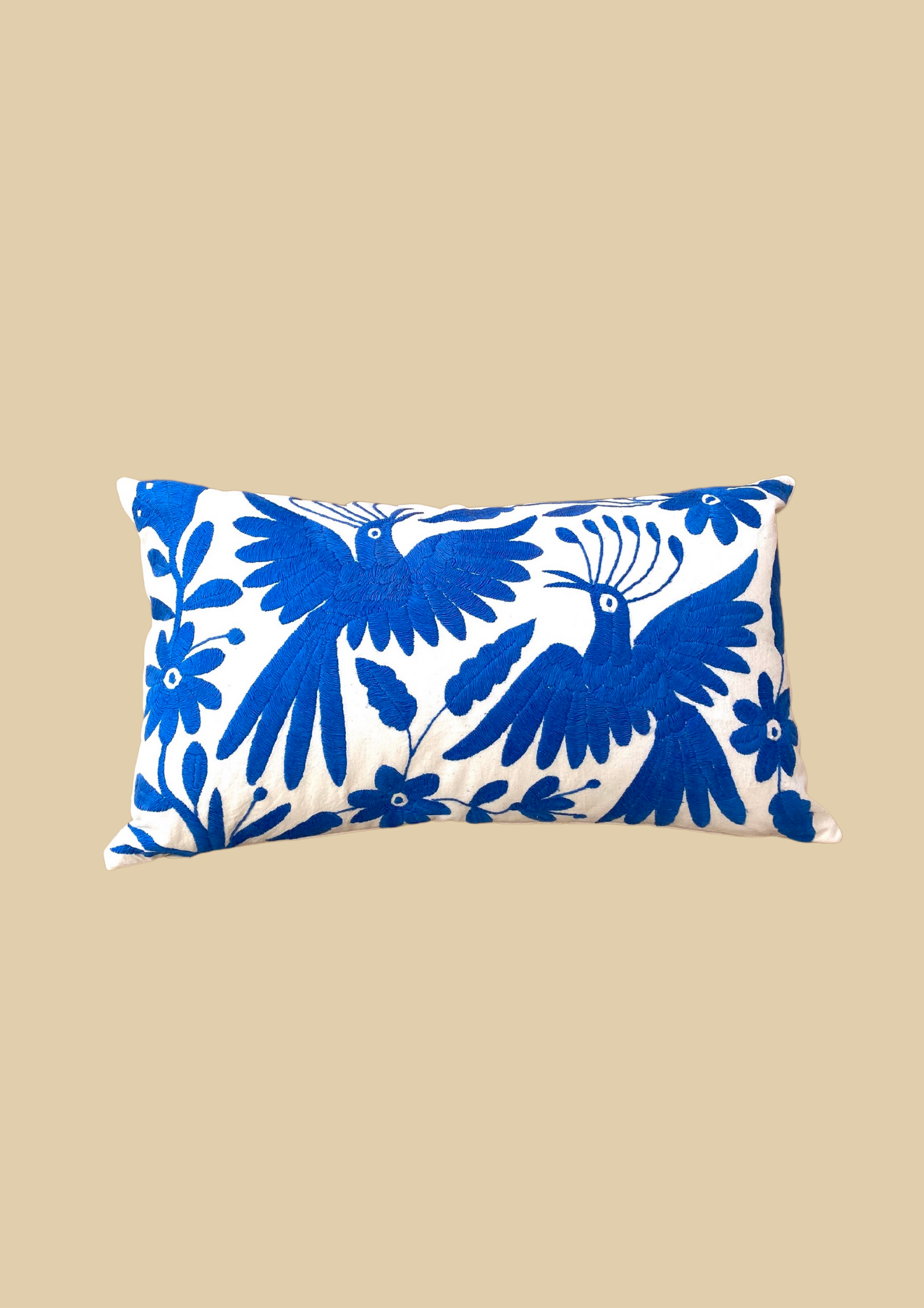 Blue embroidered cushion