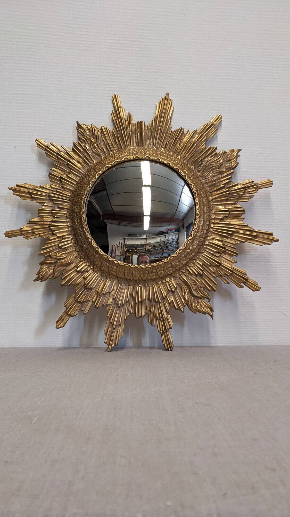 Gold metal sun mirror and witch's eye XL, Italy circa 1970.