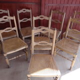Suite of oak chairs; canated seats