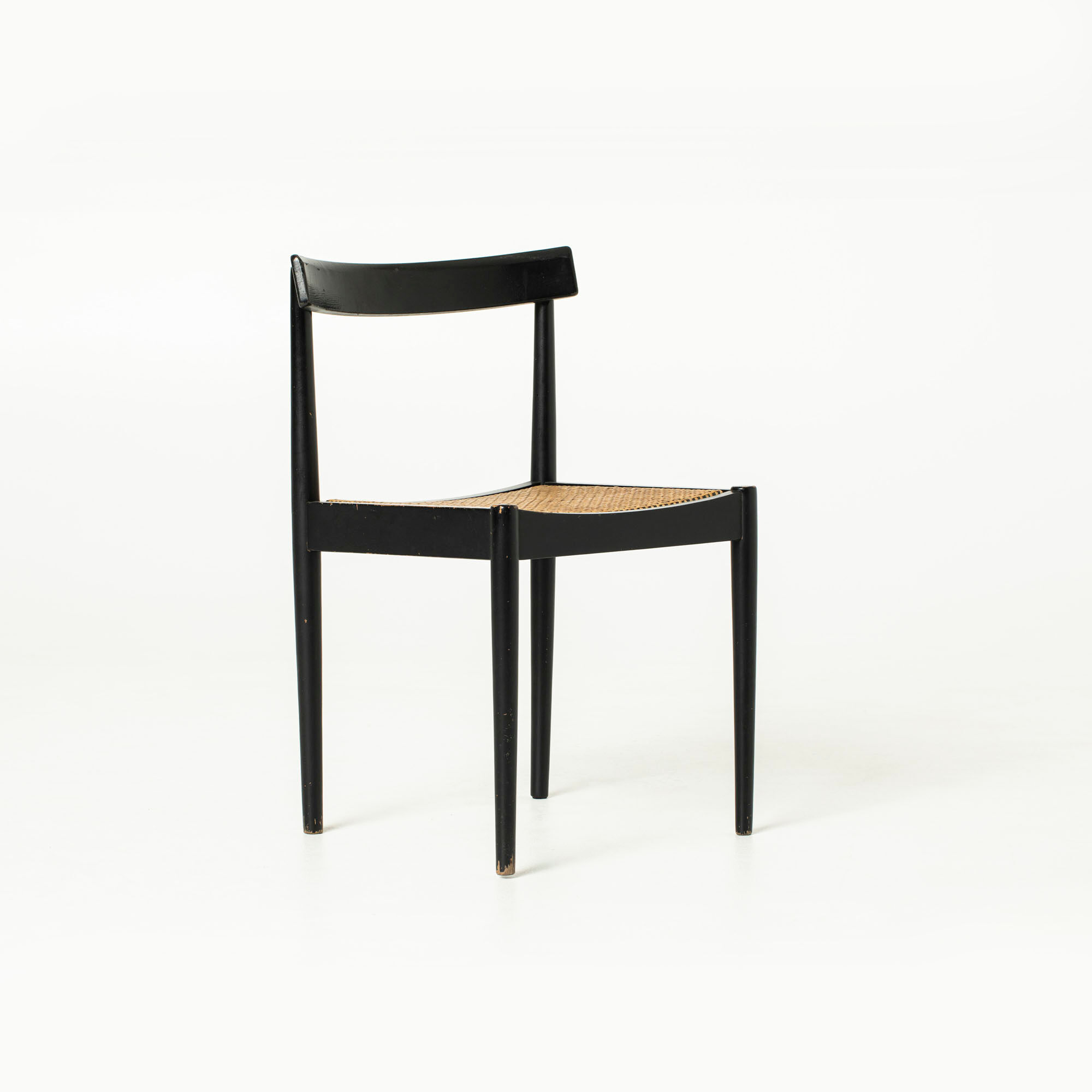 Mid-century dining chair in black laquered wood and cane