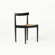 Mid-century dining chair in black laquered wood and cane
