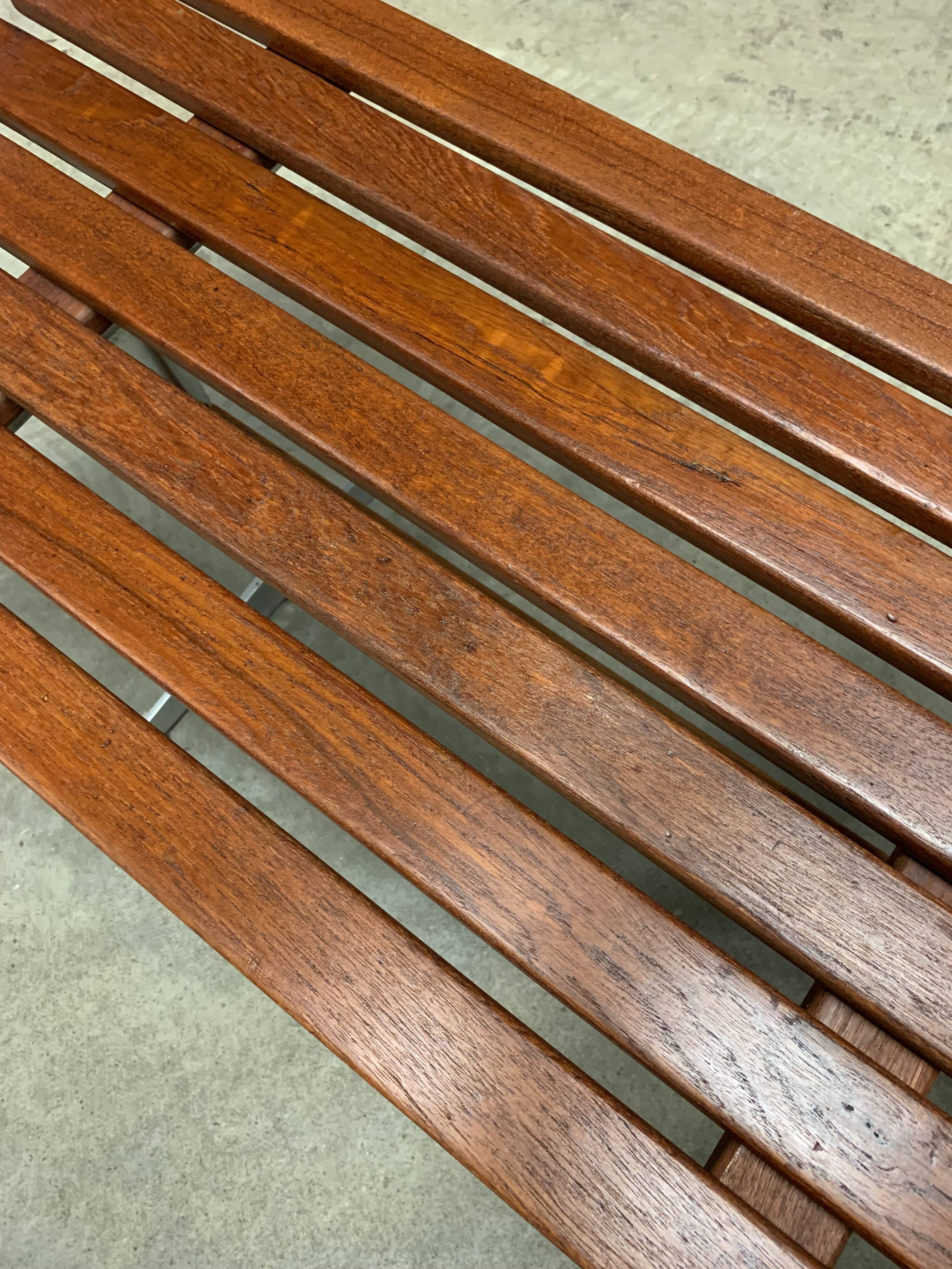 Danish slatted bench in teak and metal 1970