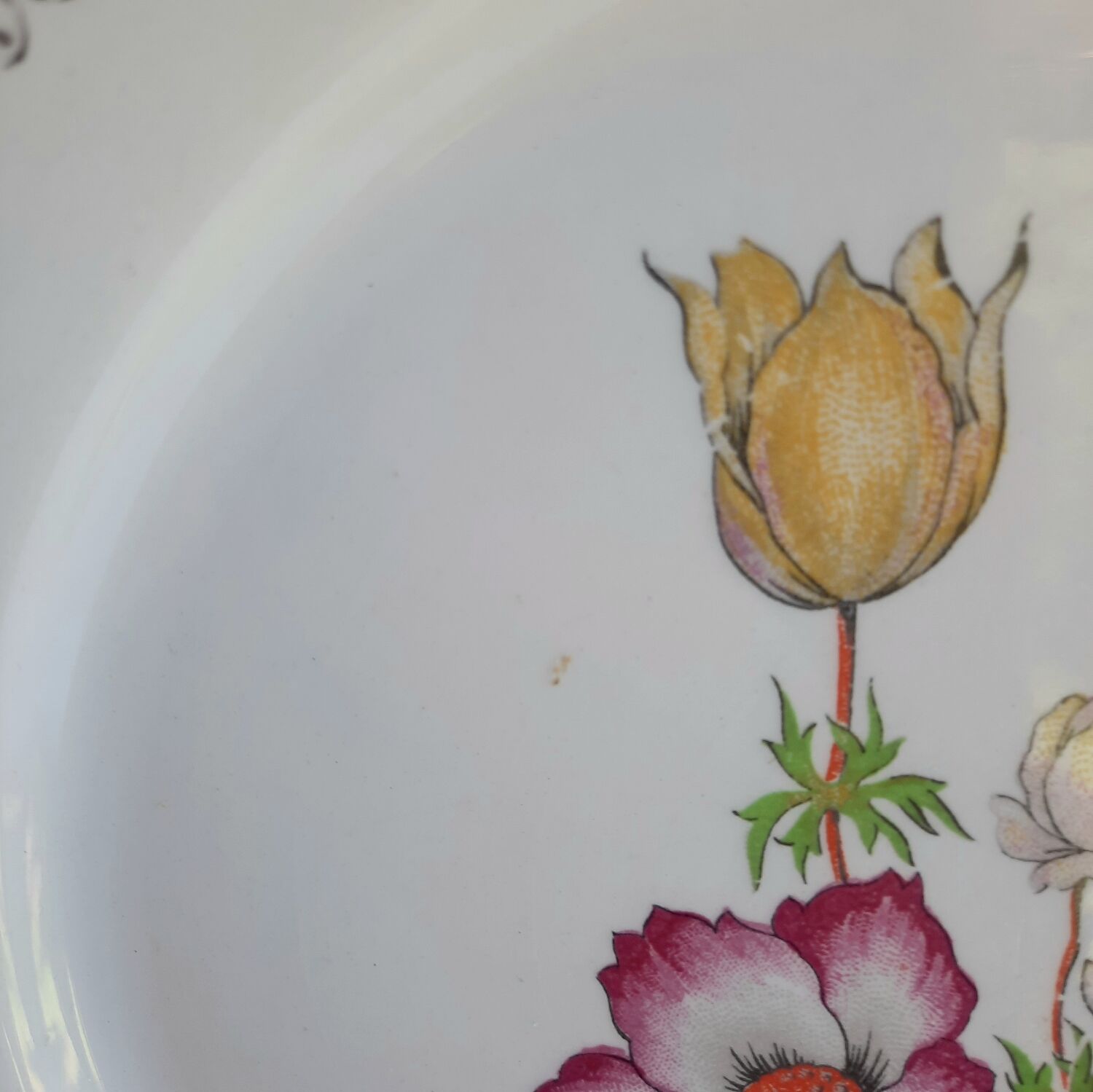 Old flat plates mismatched in earthenware