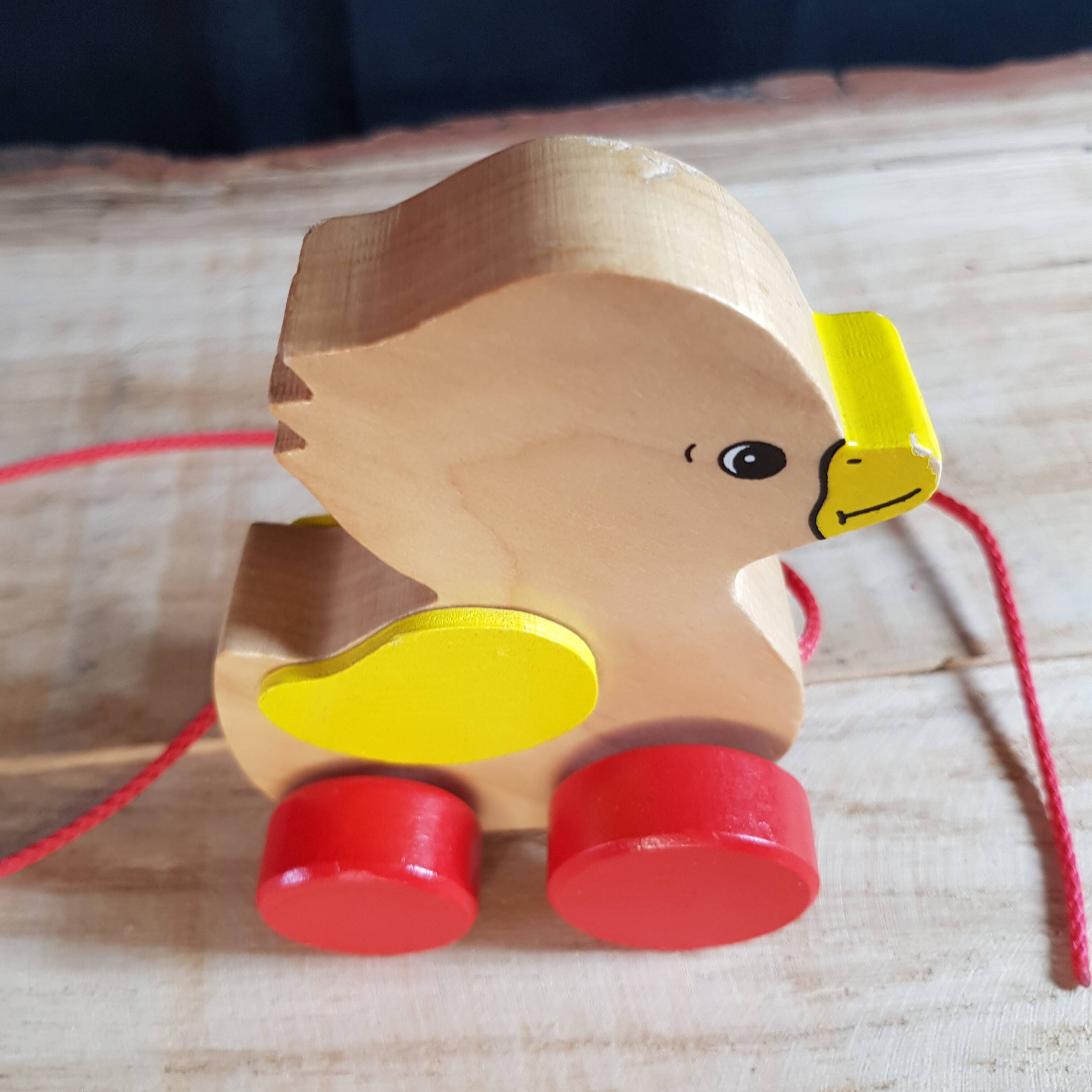 Wooden duck to pull