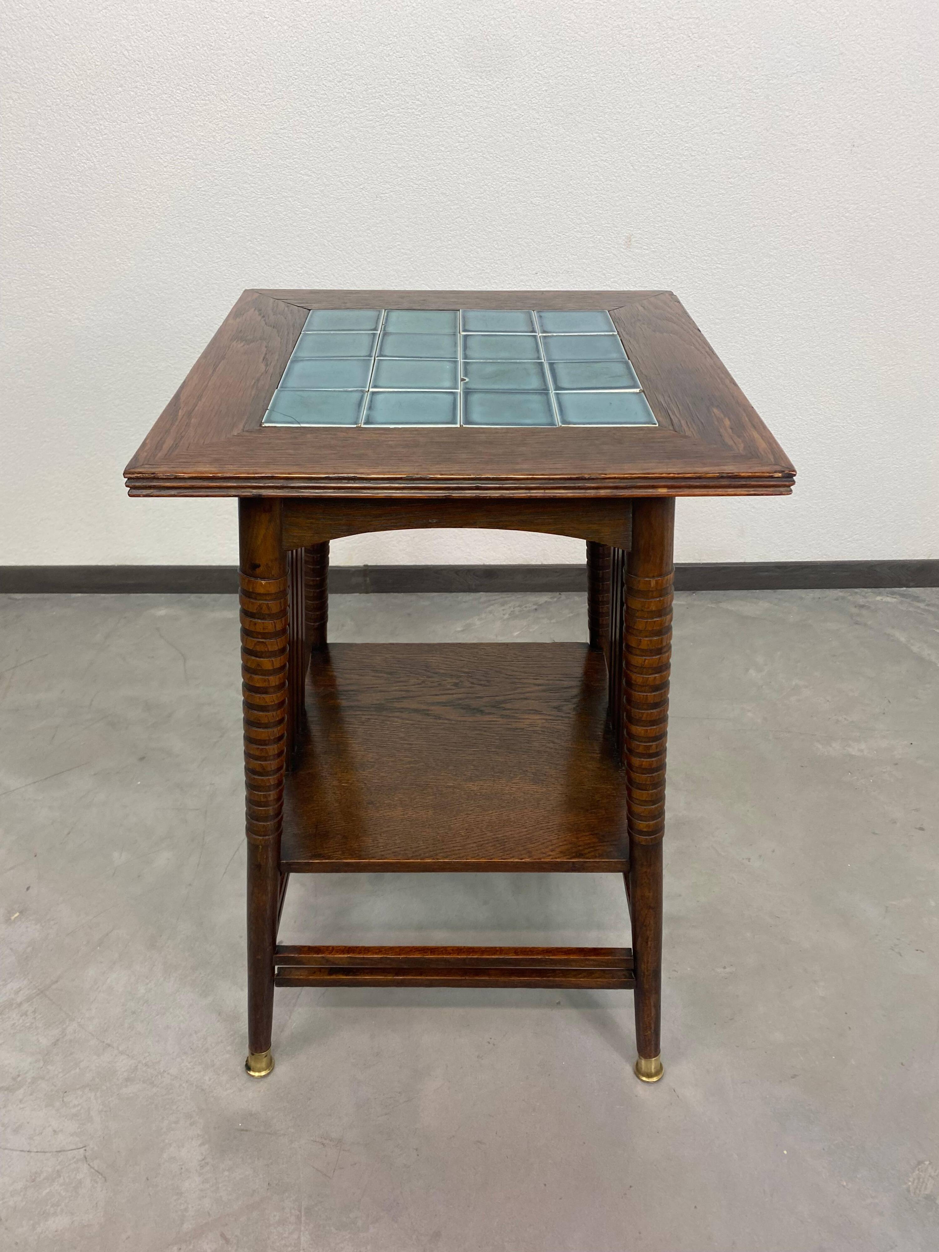 Side table in Jugendstil with a top made of blue tiles by Adolf Loos.