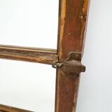 Vintage wooden window converted to a mirror