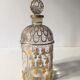 Ensemble de trois bouteilles de parfum Guerlain " Abeilles " avec une bouteille de parfum Lalique
